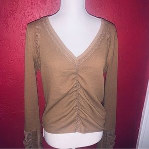 Womens Free People amber/brown v-neck top size medium never worn